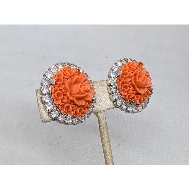 Metal Vintage 1950s Signed Kramer Carved Faux-Coral Clear Rhinestone Clip Earrings For Sale - Image 7 of 9