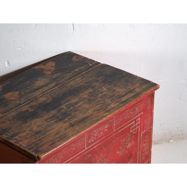 Antique chinese painted trunk in pine wood, traditional storage furniture with monochrome decoration originating from...