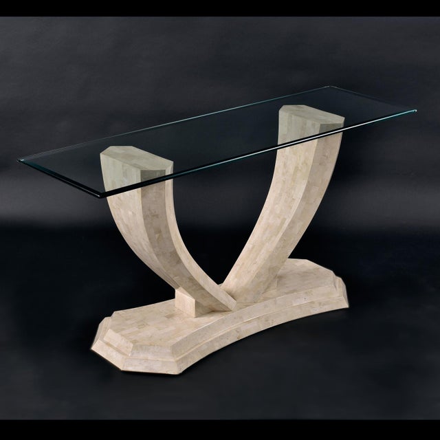Robert Marcius for Maitland Smith arched tessellated stone console table. The elegantly bowed sofa table is perfect for an...