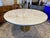 This fantastic and rare "Anello" polished bronze, white marble top dining table comfortably seats up to 6 people....