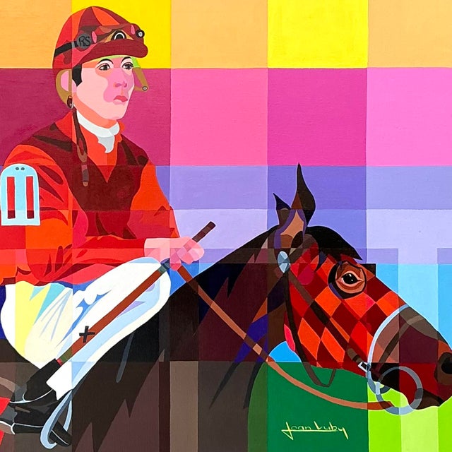 This striking original oil painting by artist Joan Luby captures the dynamic spirit of equestrian racing through a bold,...