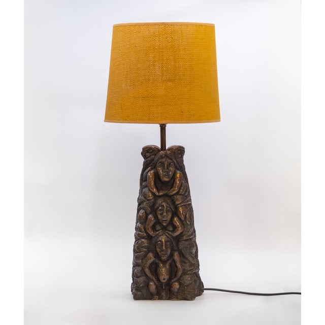 Large totem shaped double sided pottery table lamp. Circa 1970. The lamp has been re-wired with black & white 3 core and a...