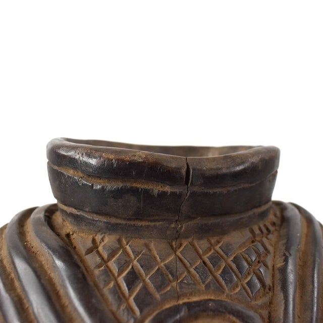 The Kuba people of the Democratic Republic of the Congo are renowned for their intricate figurative carvings, notably seen...