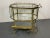 Hollywood Regency Beveled Glass, Bronze and Brass Tea Wagon or Serving Cart Beveled glass and bronze tea wagon or serving...