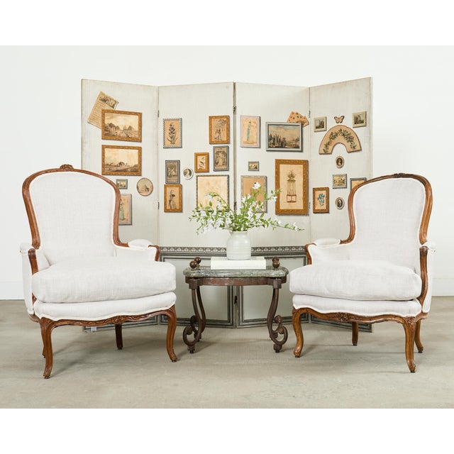 Exquisite near pair of late 19th/early 20th century French bergères having newly upholstered seats in a geometric pattern...