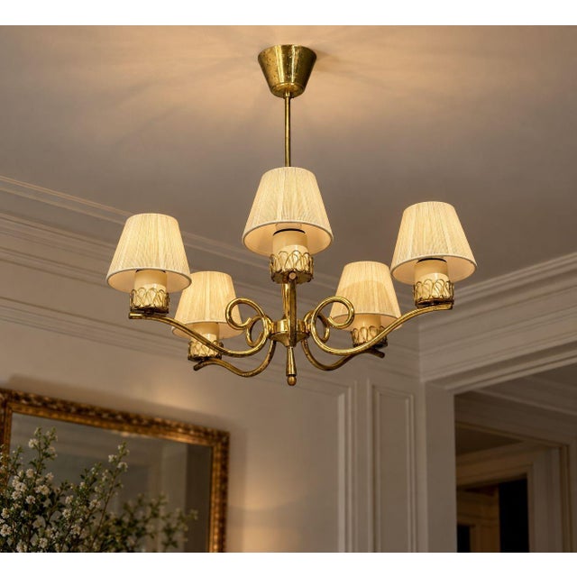 Danish Mid-Century Modern, Chandelier, Patinated Brass, Denmark, 1950s A pretty chandelier or pendant light designed and...