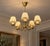 Danish Mid-Century Modern, Chandelier, Patinated Brass, Denmark, 1950s A pretty chandelier or pendant light designed and...