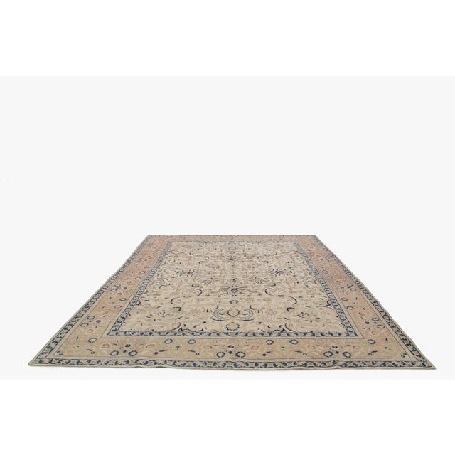 Handknotted vintage floral Persian Tabriz rug. Approximately 60-70 years old. In very good condition.