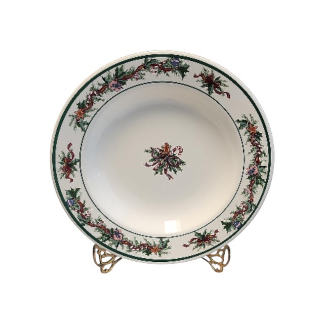 Excellent condition set of four O'Tannenbaum rimmed soup bowls with candy cane center. Sold at Macys and other Federated...