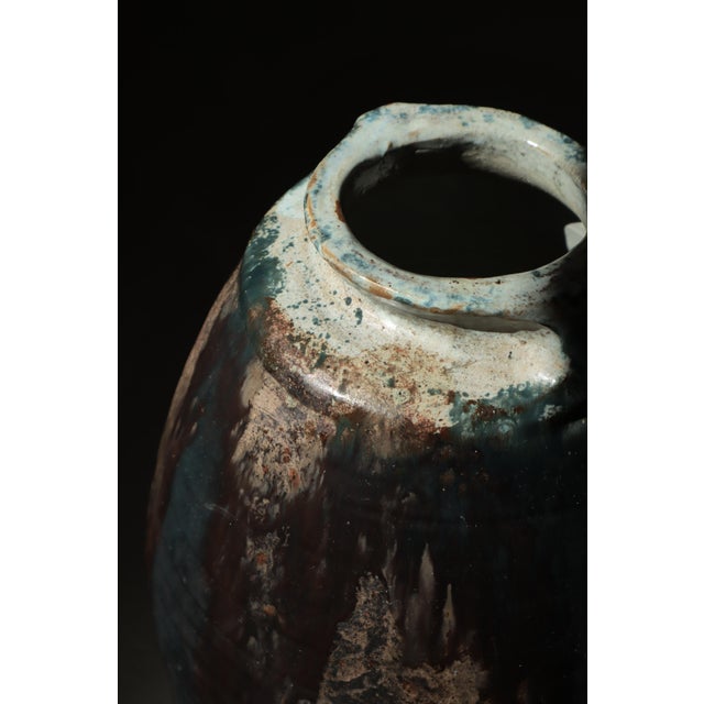 A striking and monumental Scandinavian Modern stoneware floor vase by Danish ceramist Chris Moes, executed in 1966. This...