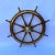Antique eight spoke ship's wheel with brass hub and trim ring. Varnished wood finish and highly polished brasses. This is...