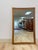 This striking vintage Broyhill Premier Sculptra mid-century modern walnut framed mirror is a highly collectible and sought...