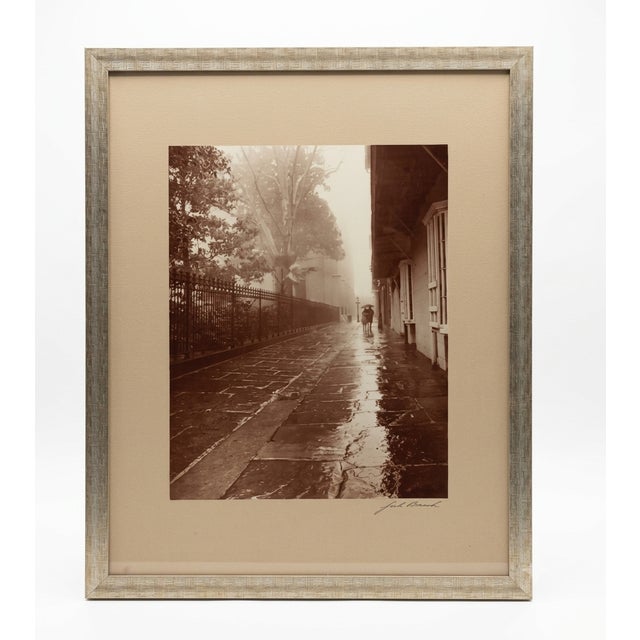 ​Artist: Jack Beech (American, Mid-20th Century) ​Subject: A romantic, atmospheric view of a couple walking under an...