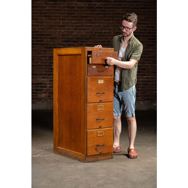 Featuring five spacious drawers, this piece offers ample storage while showcasing classic early 20th-century styling. Each...