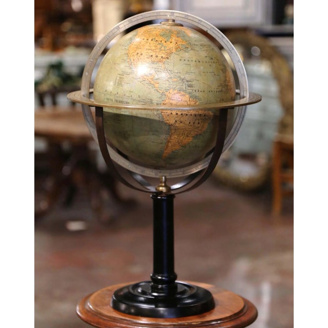 Decorate an office or a desk with this beautifully preserved antique terrestrial globe. Crafted in France, circa 1870, the...