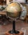 Decorate an office or a desk with this beautifully preserved antique terrestrial globe. Crafted in France, circa 1870, the...