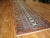 An antique Northwest Persian eclectic pattern rug from the early 20th century. Measures: 3'10'' x 17'8''.