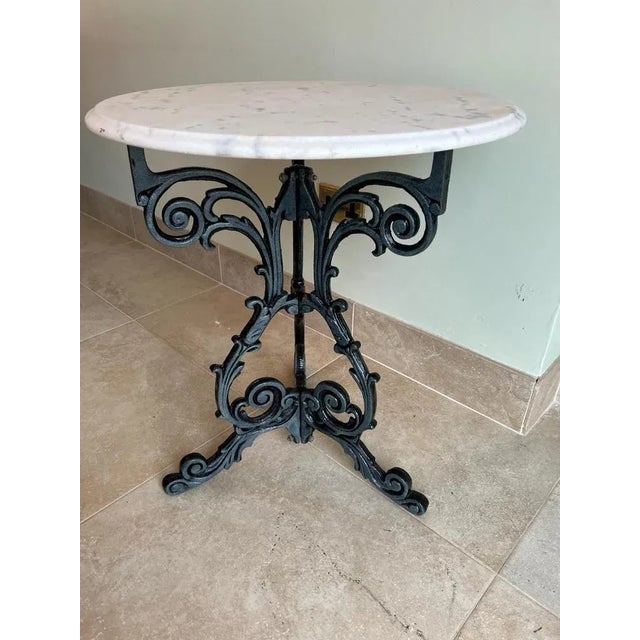 A beautiful pair of antique Victorian cast iron occasional foliate tripod table bases, it/they will dignify any room they...