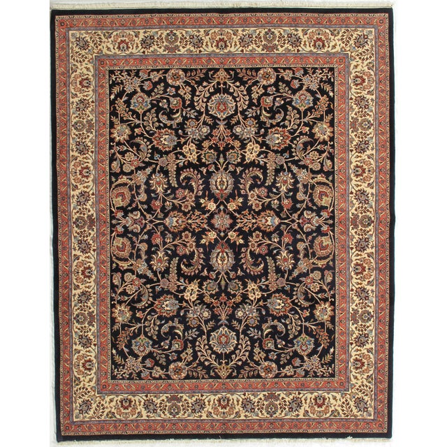 Vintage Hand-knotted Persian Mashad rug from northeastern Iran, known for its durable construction and fine workshop...