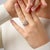 This elegant Mid Century engagement ring showcases a beautifully balanced 1.25 carat old European cut diamond, radiating...