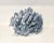 Natural Blue Coral specimen with remnants of sea life attached and a cut and polished base to protect surfaces. Each piece...
