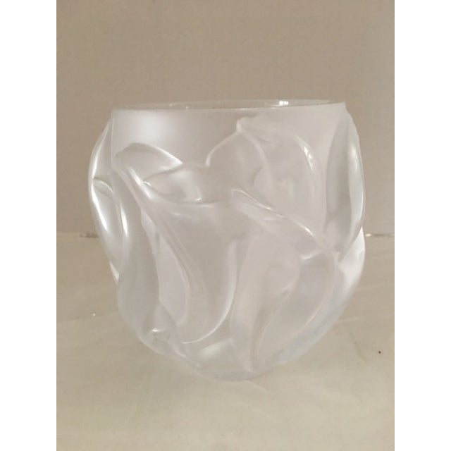Exquisite Lalique Dauphine Dolphins vase. Made in France. Pristine condition. Measures 7” high x 5” at mouth. Free of any...
