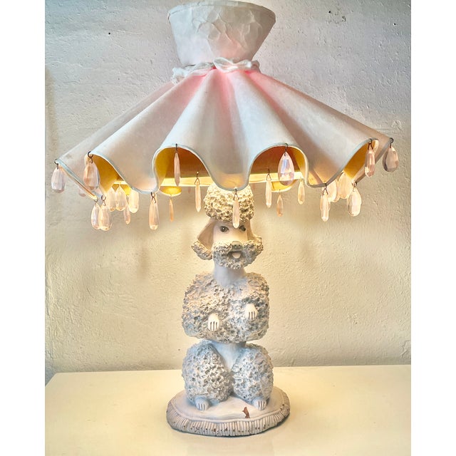 Iconic signed Phyllis Morris Poodle Lamp. These lamps, first made in Beverly Hills in the early 1950s, were fashioned...