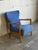 This highback lounge chair features contoured armrests and a sculpted high back. Its refined organic frame offers great...