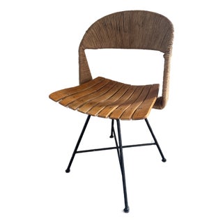 1960s Arthur Umanoff Rush, Iron, and Walnut Slat Swivel Chair For Sale