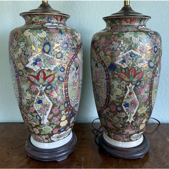 Pair of Vintage large Famille rose Chinese converted porcelain vase table lamps. Both in working condition and painted...