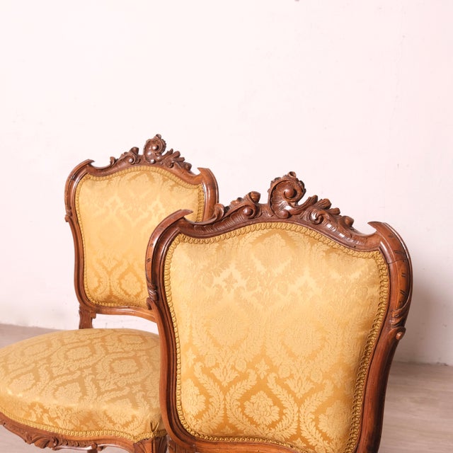 Beautiful set of 2 upholstered chairs, in fabric, early 19th century, Louis XV style. In good condition. Dimensions:...