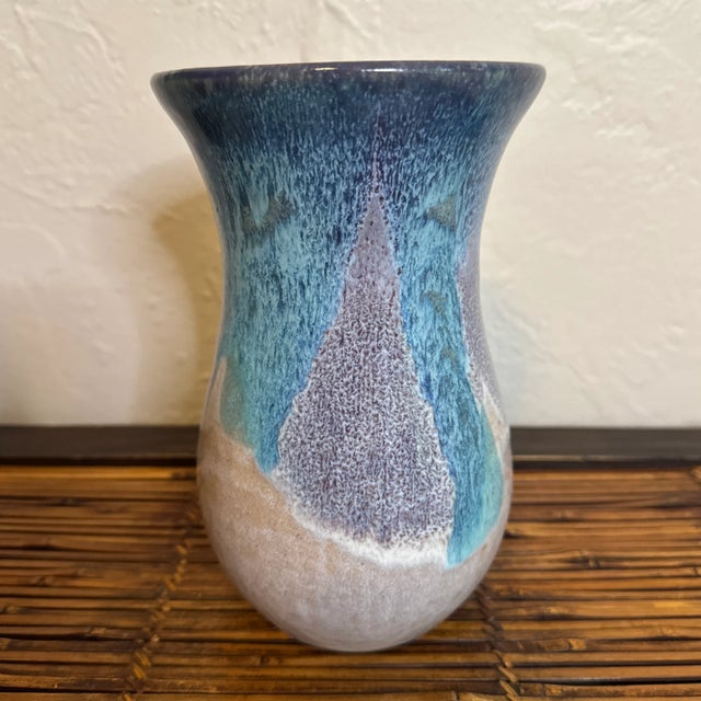 Beautiful artist signed and dated drip style pottery vase. Measures 7.5” high. Is signed on the bottom Ellen B. 9/93.