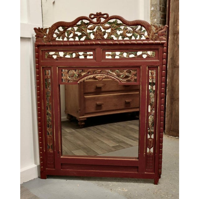 19th Century Oriental Painted Red Lacquer Mirror. This is a very attractive 19th Century Painted mirror Frame, it is...