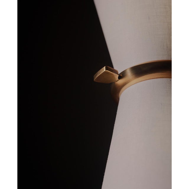 Inspired by a vintage French mid-century find, the Gable Collection celebrates antique natural brass with rich character...