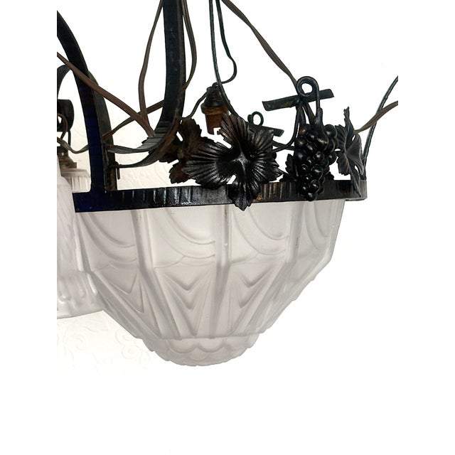 Antique French Art Nouveau Wrought Iron and Glass 4-Light Chandelier, 1930s, in Very Good conditions. Designed 1920 to...