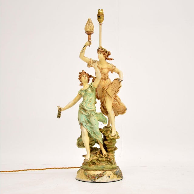 A stunning antique art nouveau period table lamp in painted cast spelter. This design is by l & f moreau, it dates from...