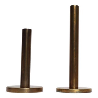 Set of Two Vintage Patinated Brass Candlesticks With Cork Bases For Sale