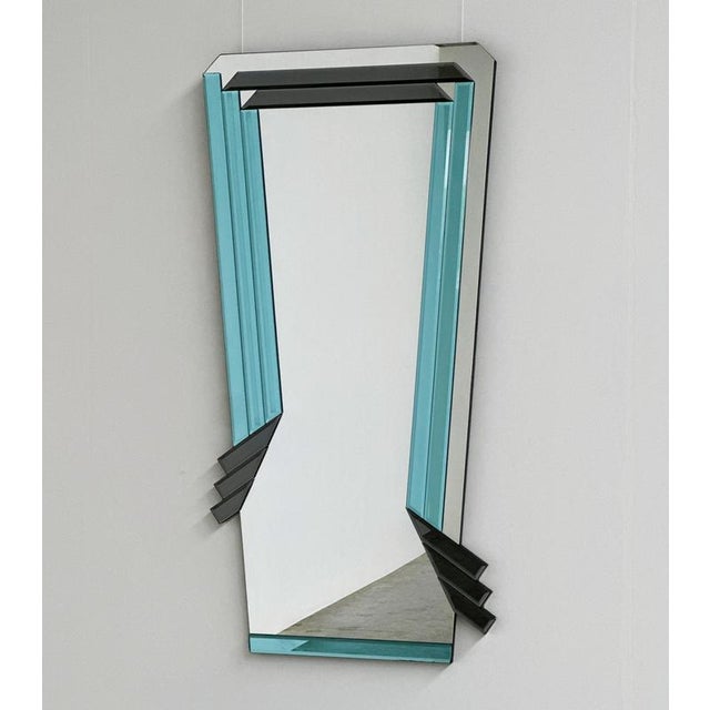 Width: 85 centimeters Height: 150 centimeters Striking postmodern geometric wall mirror, dating from circa the 1980s.A...