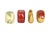 A set of four ceramic fruit themed napkin rings. Individual rings are shaped like red and green apples, a lemon, and a...