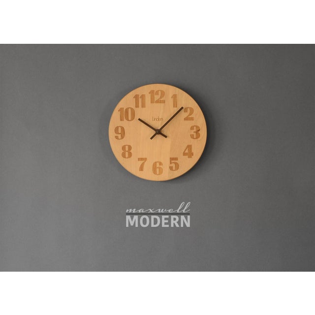 Vintage 1970s Linden two-tone round wooden clock with debossed numbers. Great minimalist Danish modern style. Movement...