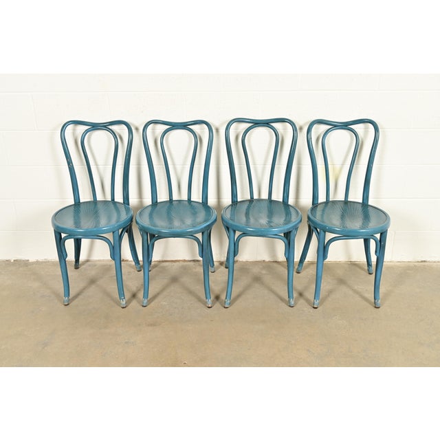 A beautiful set of four antique teal lacquered bentwood bistro chairs or dining chairs In the manner of Thonet By Jacob &...