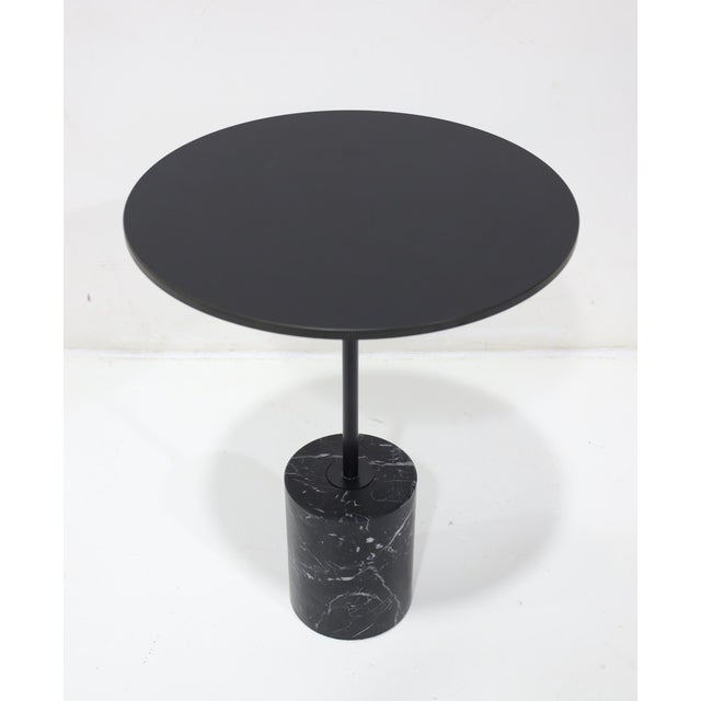 This is a great looking side table by Lapalma. The Jey side table in black. A black Marquina marble base on a powder...
