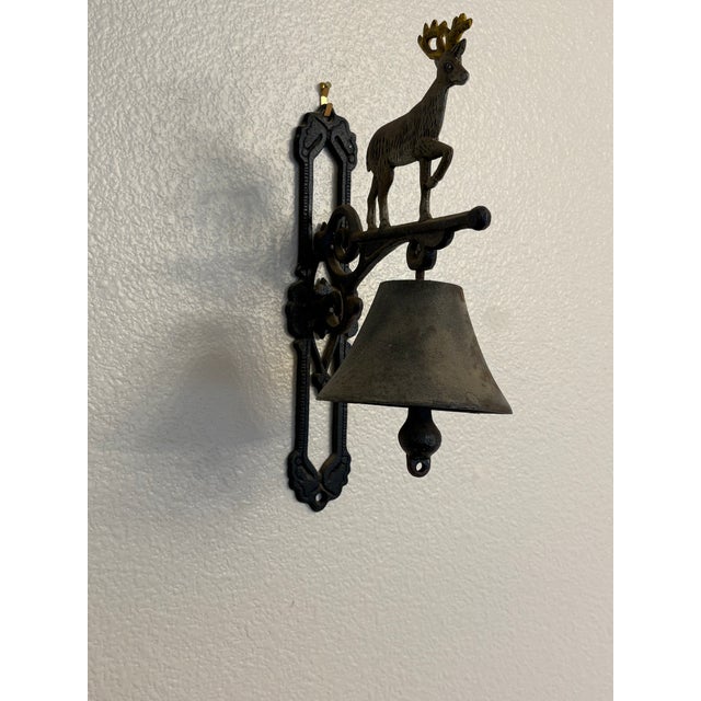 Circa 1880 This is a classic example of a Yankee Forge Bell. This Bell futures a large stag sat atop the bell that was...