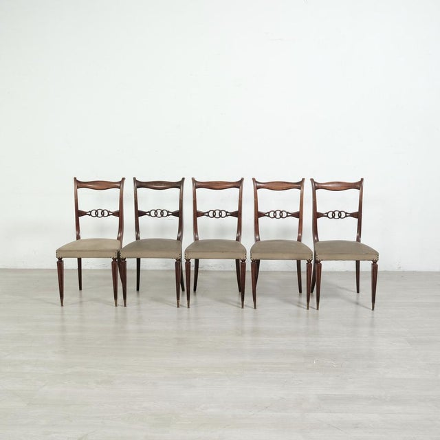 Set consisting of 5 original design chairs from the 50s and 60s. Wooden structure, solid and stable. The rear legs and...