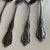 Vintage stainless steel floral design set 3 dinner forks 7.25"L and 2 table spoons 6.75"L , makers mark reads "Distinction...