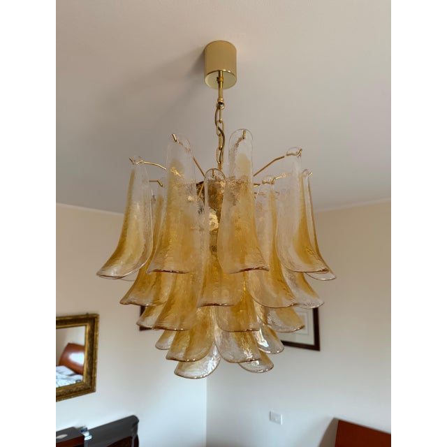 Murano glass chandelier attributed to Mazzega or La Murrina, from the 1970s. It features a cascading design with numerous...