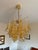 Murano glass chandelier attributed to Mazzega or La Murrina, from the 1970s. It features a cascading design with numerous...