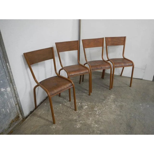 Stackable Chairs from Mullca, 1960s, Set of 4, in Good conditions. Designed 1960 to 1969 This piece is attributed to the...