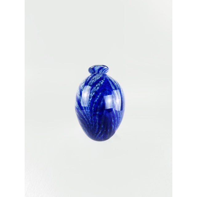 A visually arresting example of vintage art glass, this bowl is distinguished by its exceptional surface decoration — an...