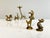 Small brass figurines in Walter Bosse's characteristic, minimalist style: five animals – goat, duck, giraffe, rabbit, and...